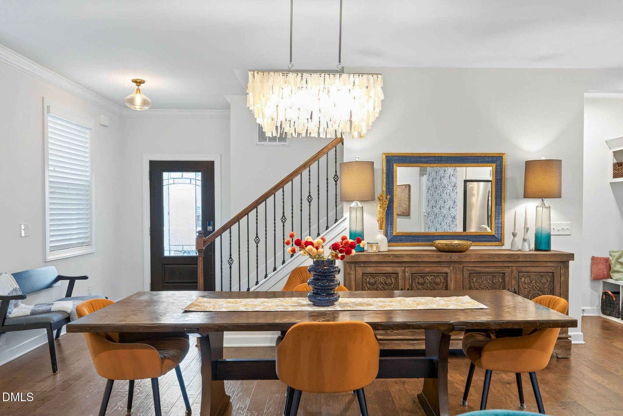 2928 Murray Rdg Trail Apex, NC 27502 - Photo 5 of 35 a view of a dining room with furniture window and wooden floor