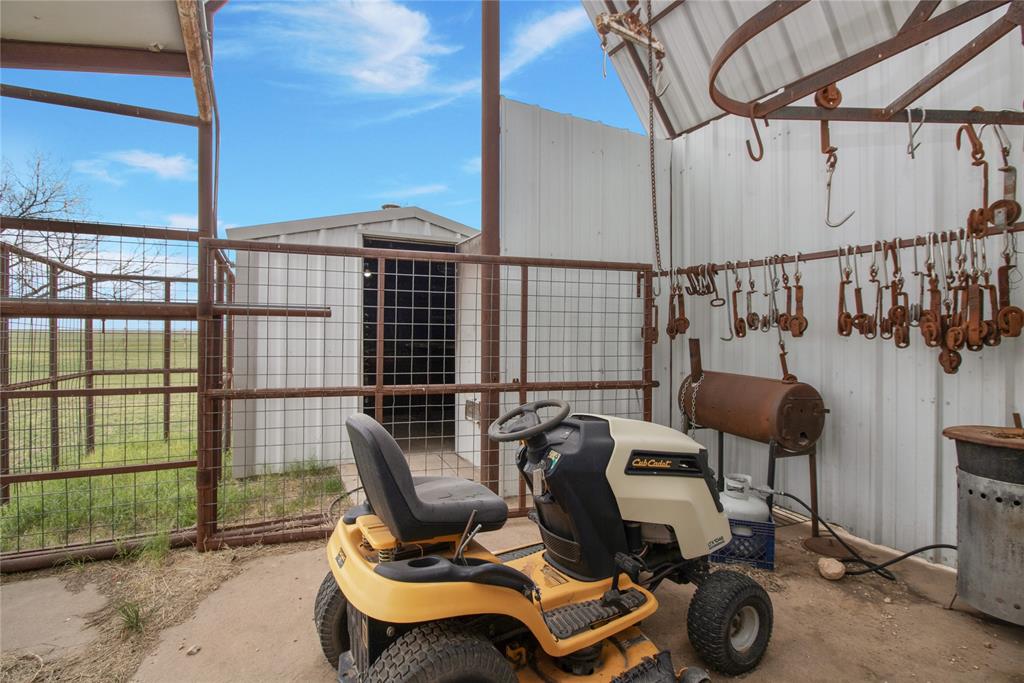 2102 County Road 233 Ballinger, TX 76821 - Photo 14 of 16 a room with gym equipment
