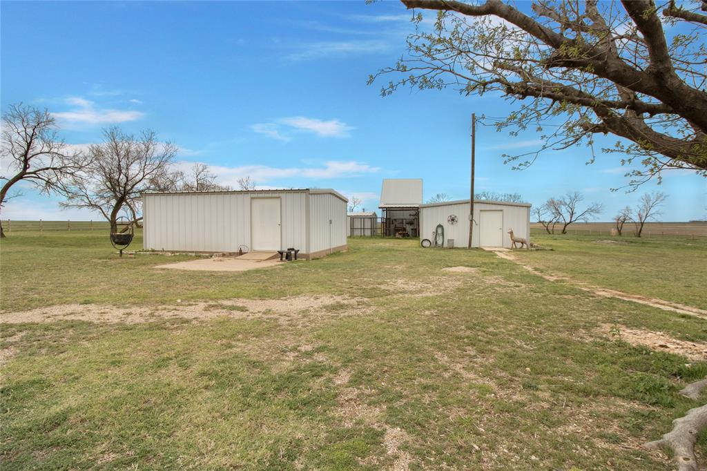 2102 County Road 233 Ballinger, TX 76821 - Photo 16 of 16 a view of a water fountain and a big yard