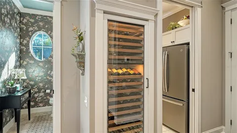 a view of a bathroom with a door and a window