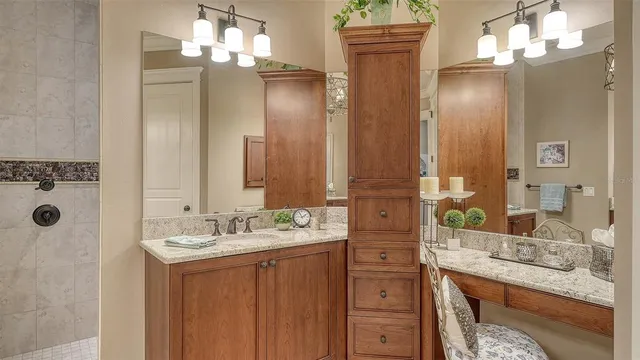 a bathroom with a double vanity sink and a mirror