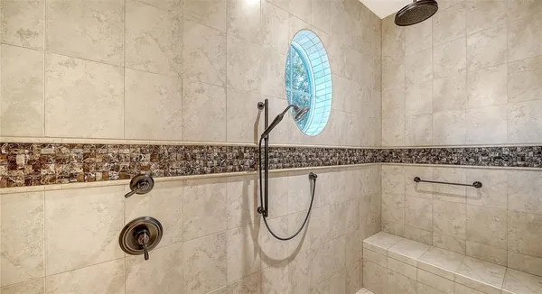 a bathroom with a bathtub and a sink