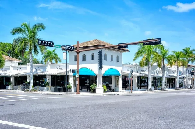 a view of a building with a street