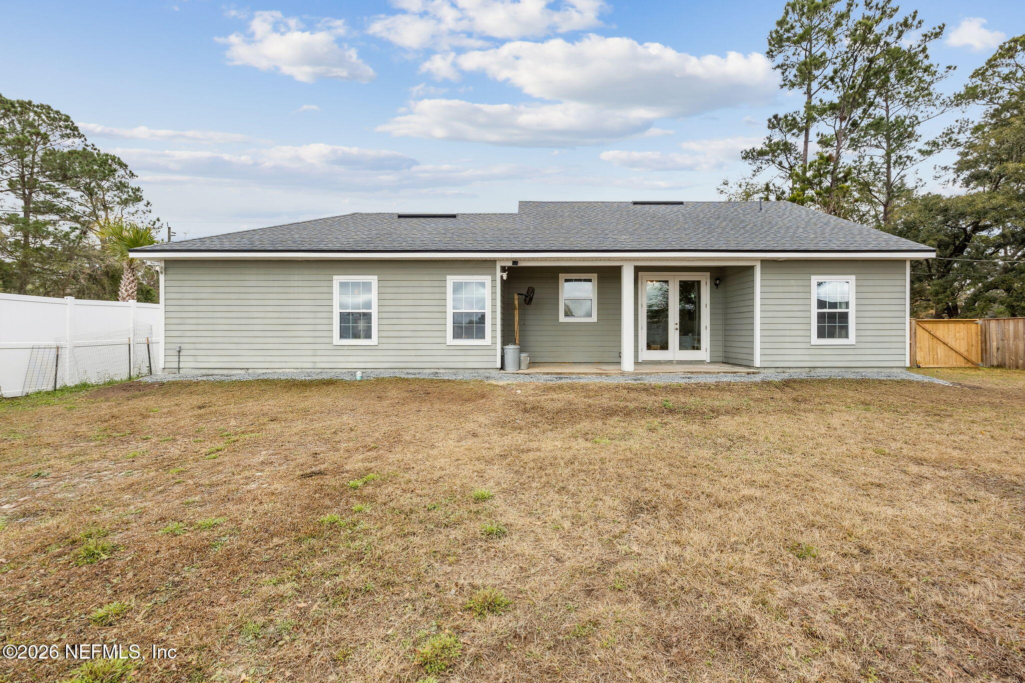 96718 Blackrock Road Yulee, FL 32097 - Photo 50 of 54 front view of house with a yard