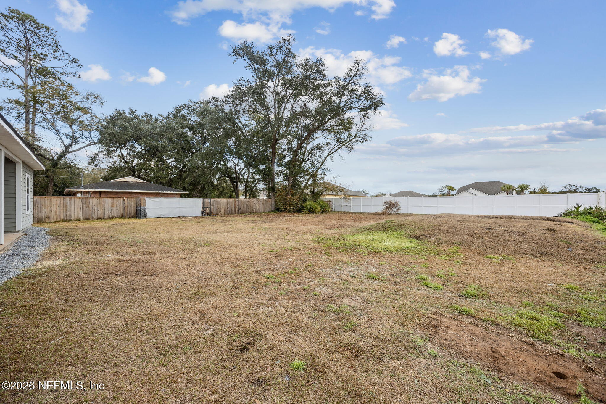 96718 Blackrock Road Yulee, FL 32097 - Photo 54 of 54 a view of an outdoor space and a yard