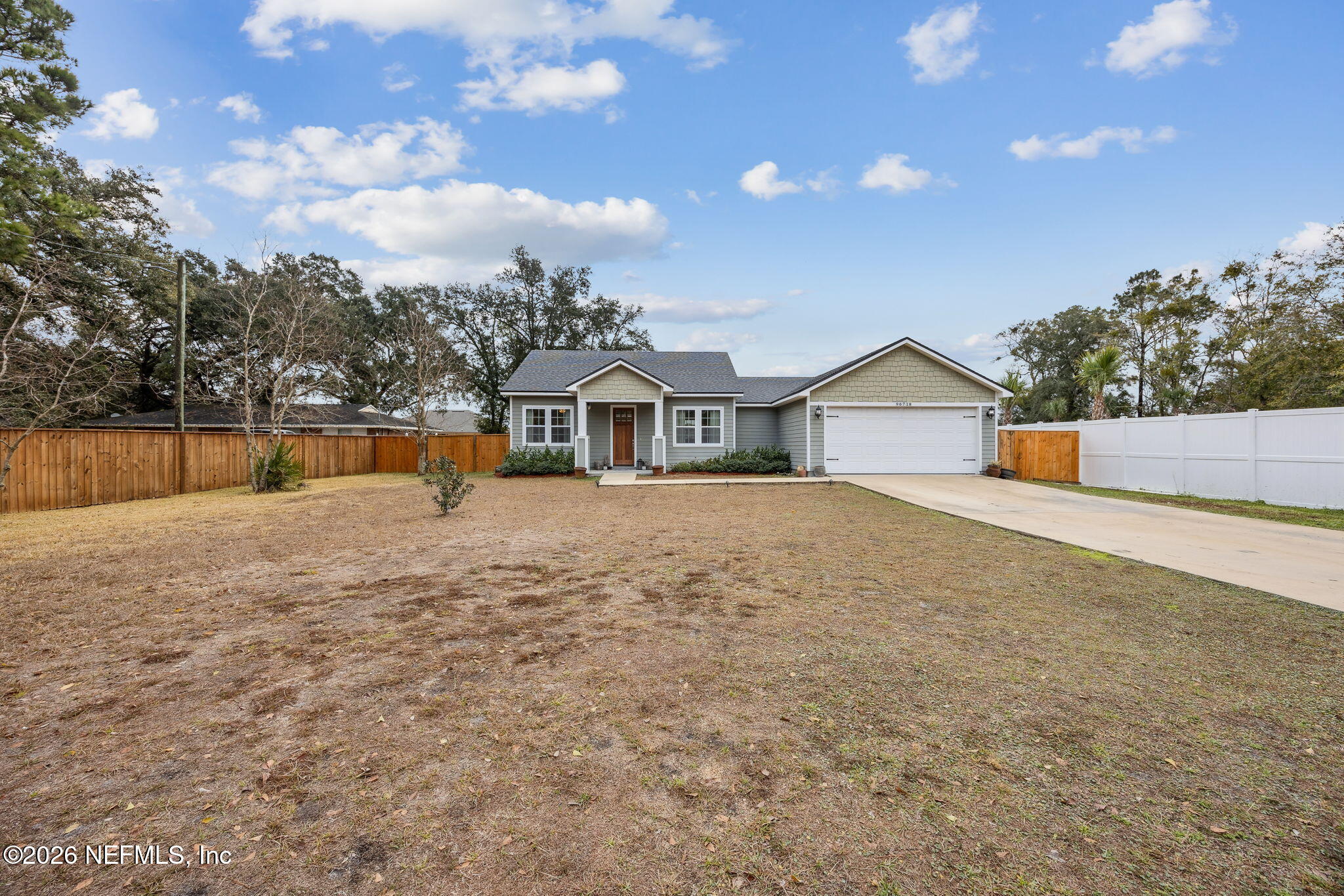 96718 Blackrock Road Yulee, FL 32097 - Photo 10 of 54 a view of house with outdoor space and sitting area