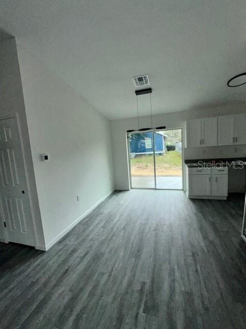 628 Northwest 2nd Street Ocala, FL 34475 - Photo 7 of 7 a view of a kitchen with a sink and a stove