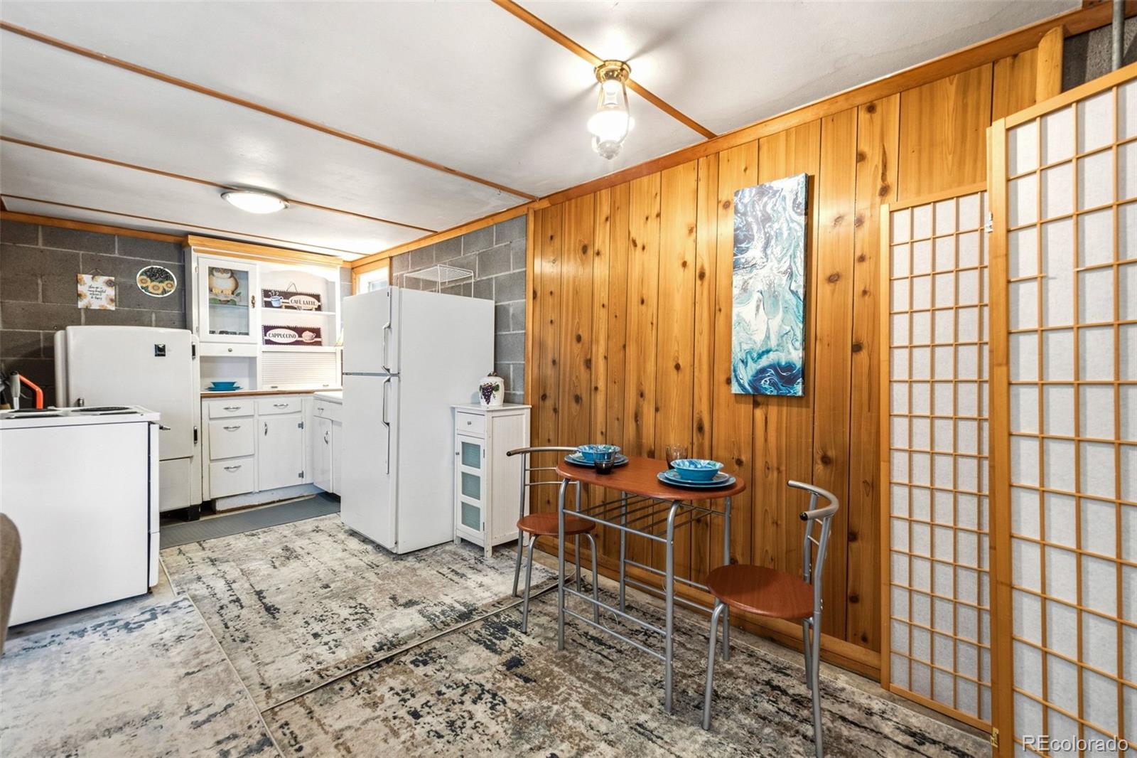 25845 Wilkerson Road Conifer, CO 80433 - Photo 6 of 16 a bathroom with a sink a toilet and shower