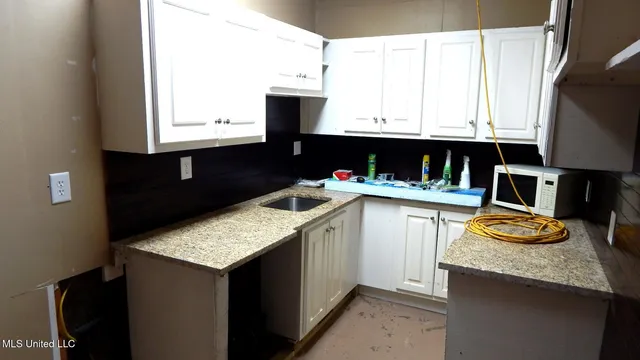 $60,000 | 395 East Van Dorn Avenue, Holly Springs, MS 38635