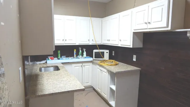 $60,000 | 395 East Van Dorn Avenue, Holly Springs, MS 38635