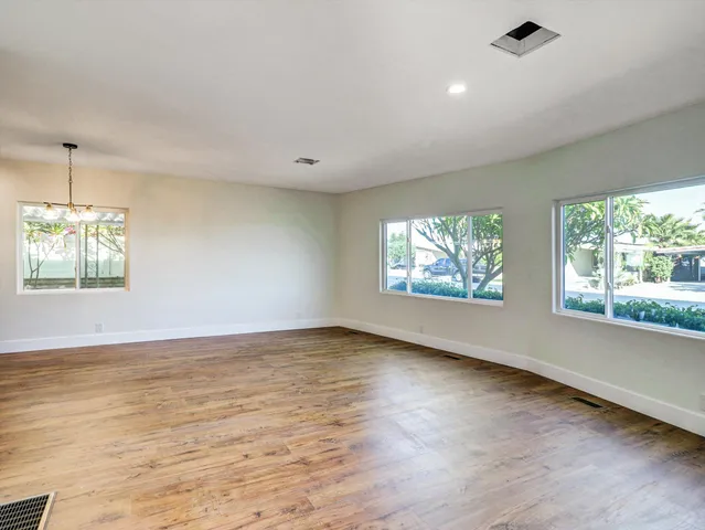 a view of a kitchen with a sink and a microwave