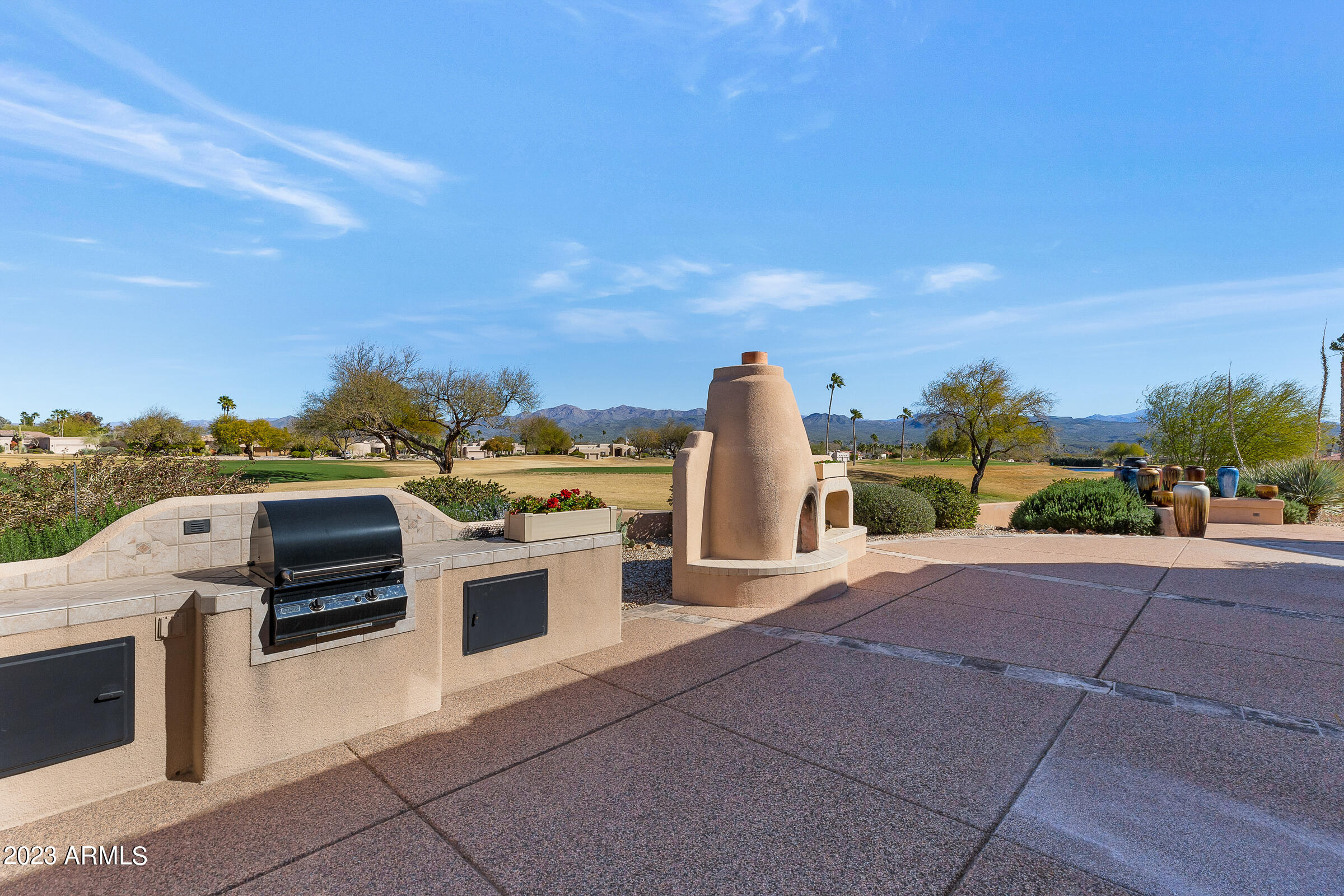 25005 North Vado Court Rio Verde, AZ 85263 - Photo 41 of 50 grill area and fire stack back patio