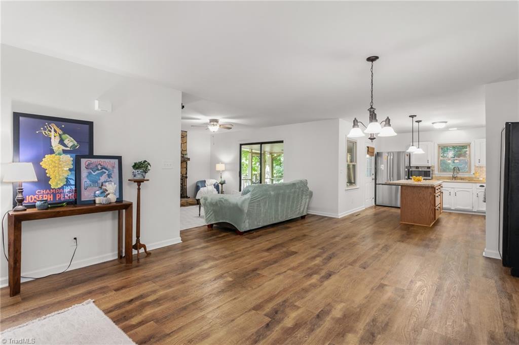 7206 Haw Ridge Road Summerfield, NC 27358 - Photo 5 of 49 LVP flooring throughout main level