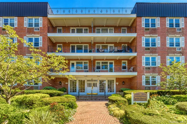 a front view of a multi story residential apartment building