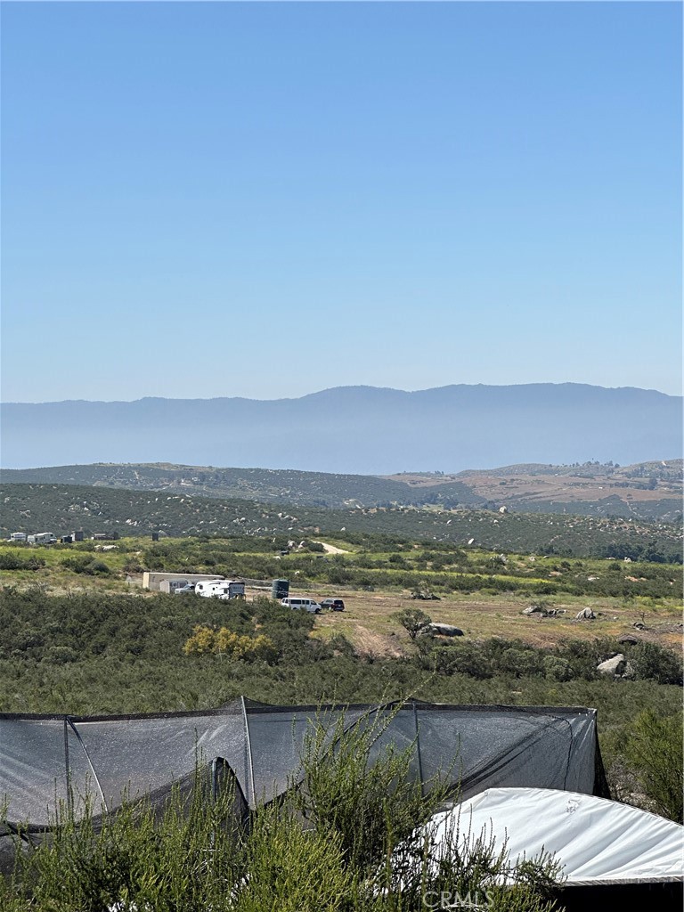 66 Rocky Knoll Road Hemet, CA 92544 - Photo 4 of 11 an aerial view of residential building and ocean view