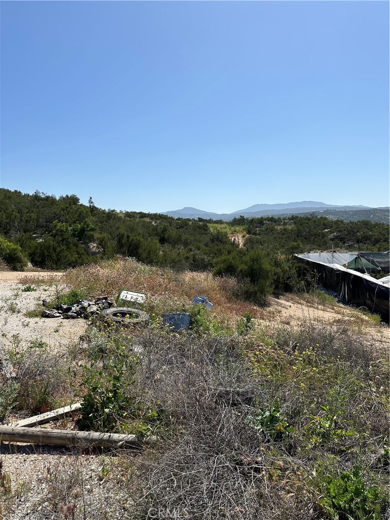 66 Rocky Knoll Road Hemet, CA 92544 - Photo 6 of 11 a view of lake with mountain