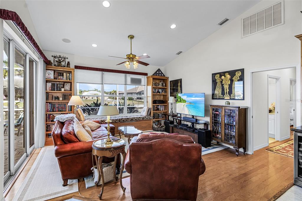 400 Gun Cay Lane Punta Gorda, FL 33950 - Photo 15 of 50 a living room with furniture and a flat screen tv
