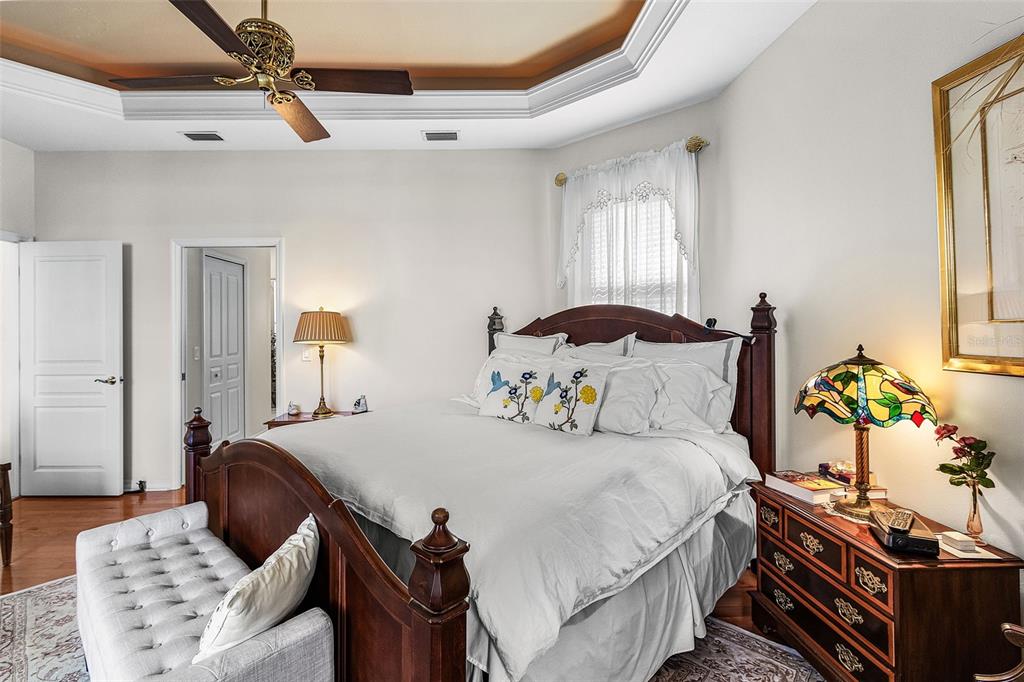 400 Gun Cay Lane Punta Gorda, FL 33950 - Photo 16 of 50 a bedroom with a bed and wooden floor