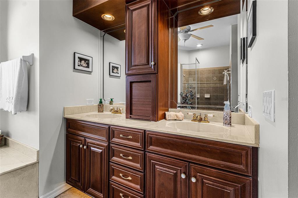 400 Gun Cay Lane Punta Gorda, FL 33950 - Photo 21 of 50 a bathroom with a sink double vanity and a mirror