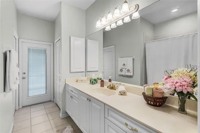 a view of a patio with table and chairs
