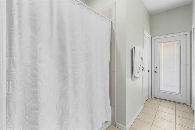 a view of a swimming pool with a patio