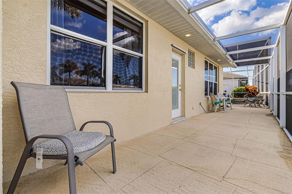 400 Gun Cay Lane Punta Gorda, FL 33950 - Photo 35 of 50 a view of a patio with table and chairs