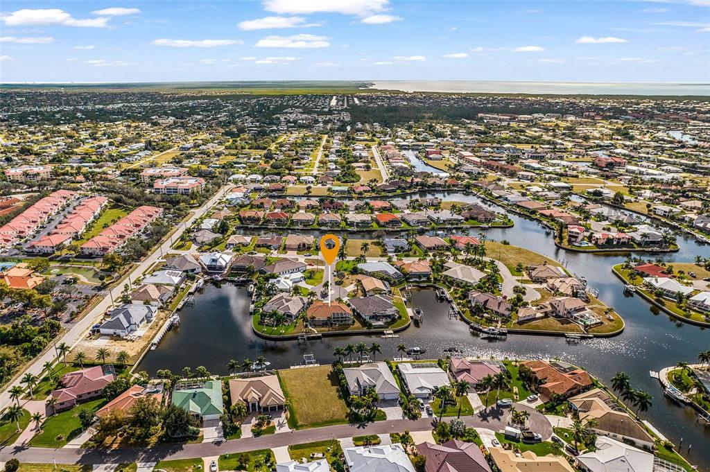 400 Gun Cay Lane Punta Gorda, FL 33950 - Photo 45 of 50 an aerial view of residential building with parking space