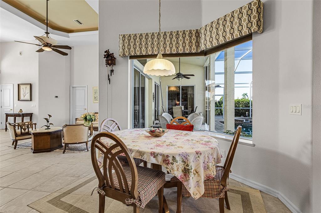 400 Gun Cay Lane Punta Gorda, FL 33950 - Photo 10 of 50 a dining room with furniture and window