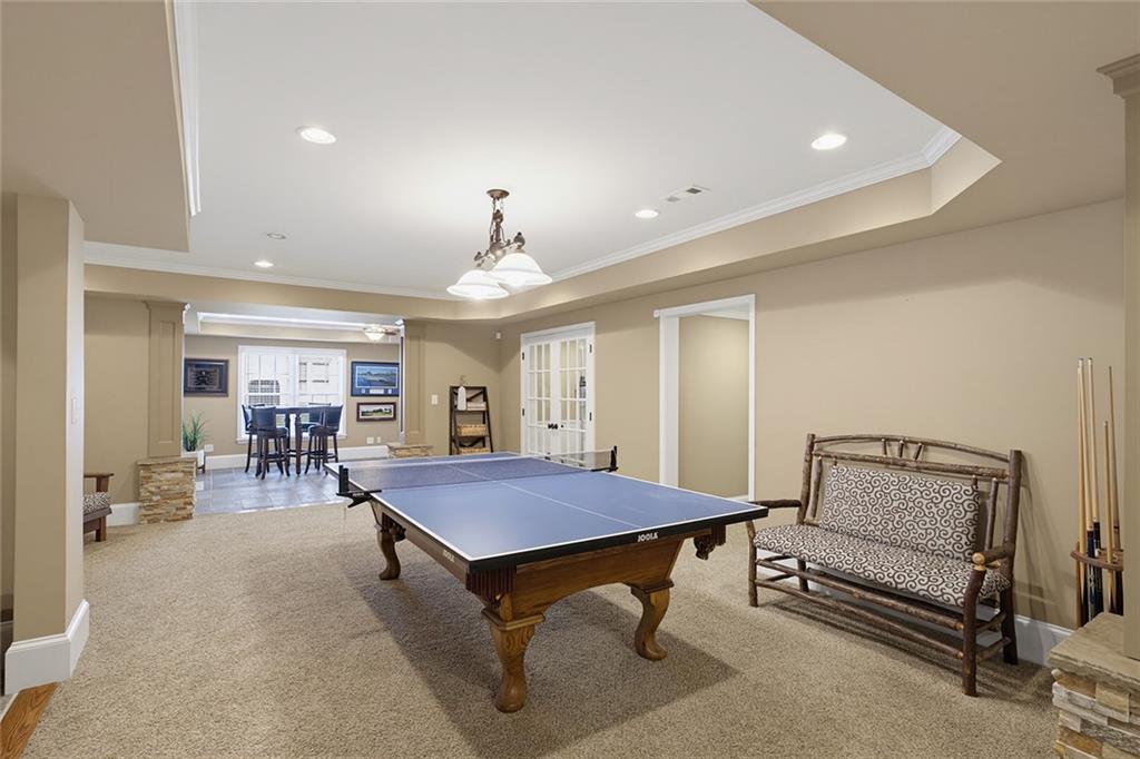 14442 Club Circle Milton, GA 30004 - Photo 50 of 82 a living room with furniture and a table