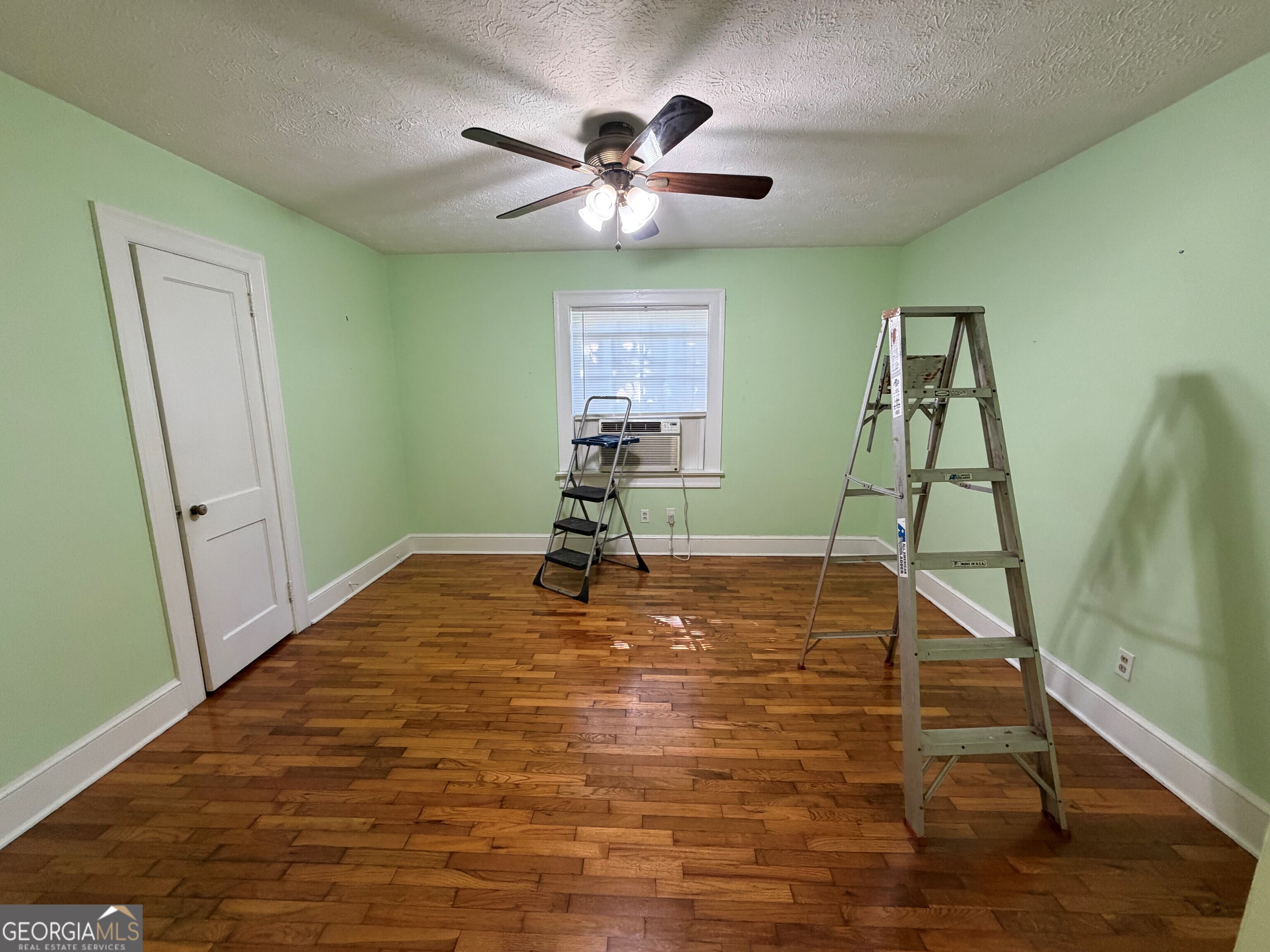 2619 Maple Road Southeast Rome, GA 30161 - Photo 26 of 31 a room with a window and a ceiling fan