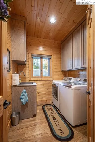 a bathroom with a granite countertop toilet sink and mirror