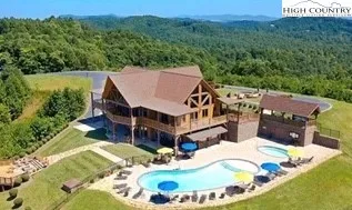 a view of a terrace with a table and chairs