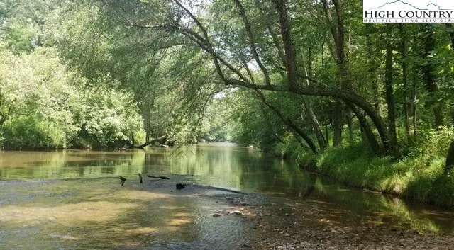 a view of an outdoor space with a lake view