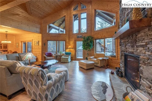 a outdoor living space with furniture and a fireplace