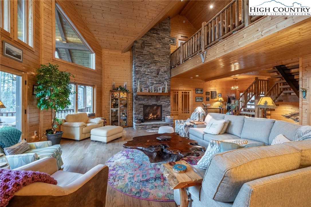 1989 Johns Ridge Parkway Lenoir, NC 28645 - Photo 10 of 50 a outdoor living space with furniture and a fireplace