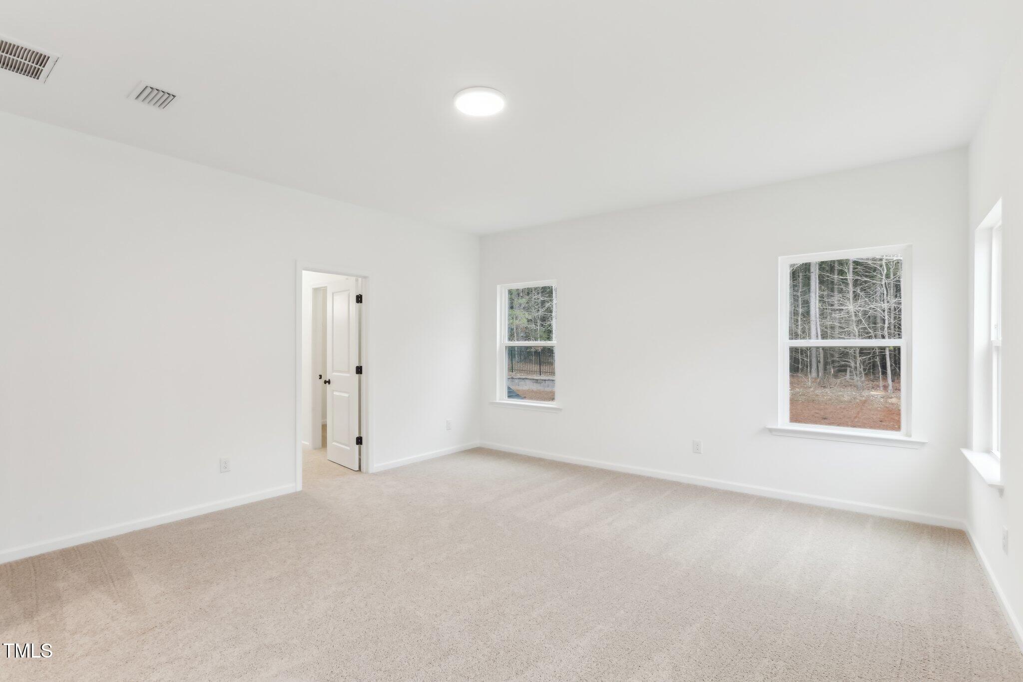 3325 Oakfields Road, Unit LOT 7 New Hill, NC 27562 - Photo 24 of 49 Primary Suite