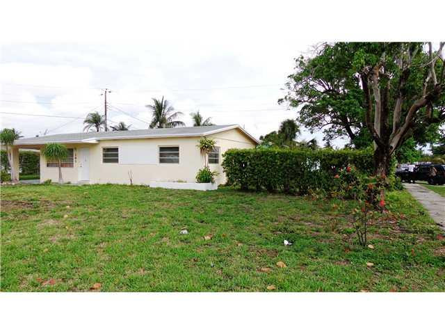 161 Northeast 20th Street Pompano Beach, FL 33060 - Photo 2 of 10 a black and white photo of a house
