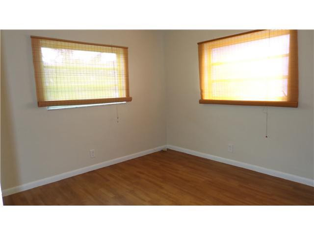 161 Northeast 20th Street Pompano Beach, FL 33060 - Photo 5 of 10 a black and white photo of a room