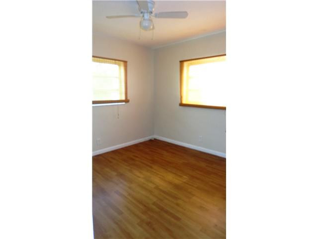 161 Northeast 20th Street Pompano Beach, FL 33060 - Photo 7 of 10 a view of an empty room with a window