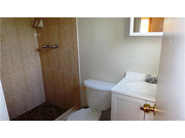 161 Northeast 20th Street Pompano Beach, FL 33060 - Photo 8 of 10 a bathroom with a sink and a toilet