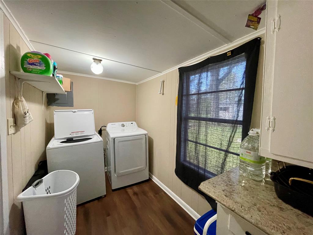 10806 Newson Road Keithville, LA 71047 - Photo 19 of 24 a room with storage and utility