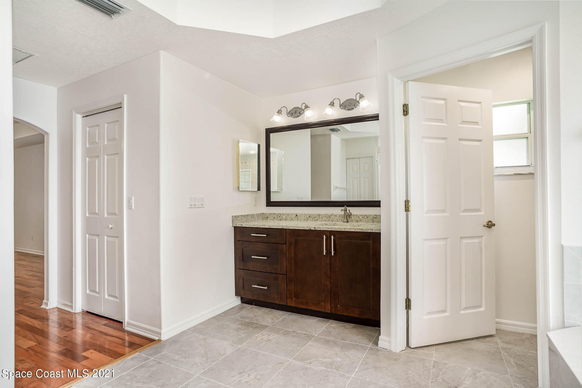 4353 Long Lake Road Melbourne, FL 32934 - Photo 14 of 35 En Suite Bath