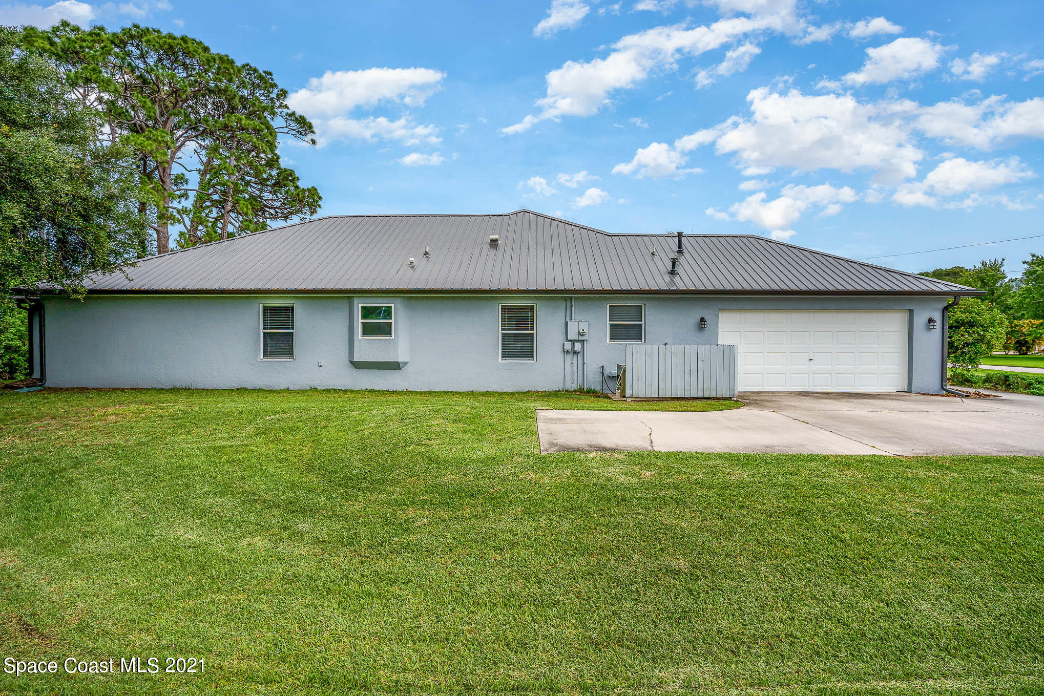 4353 Long Lake Road Melbourne, FL 32934 - Photo 28 of 35 Exterior Garage