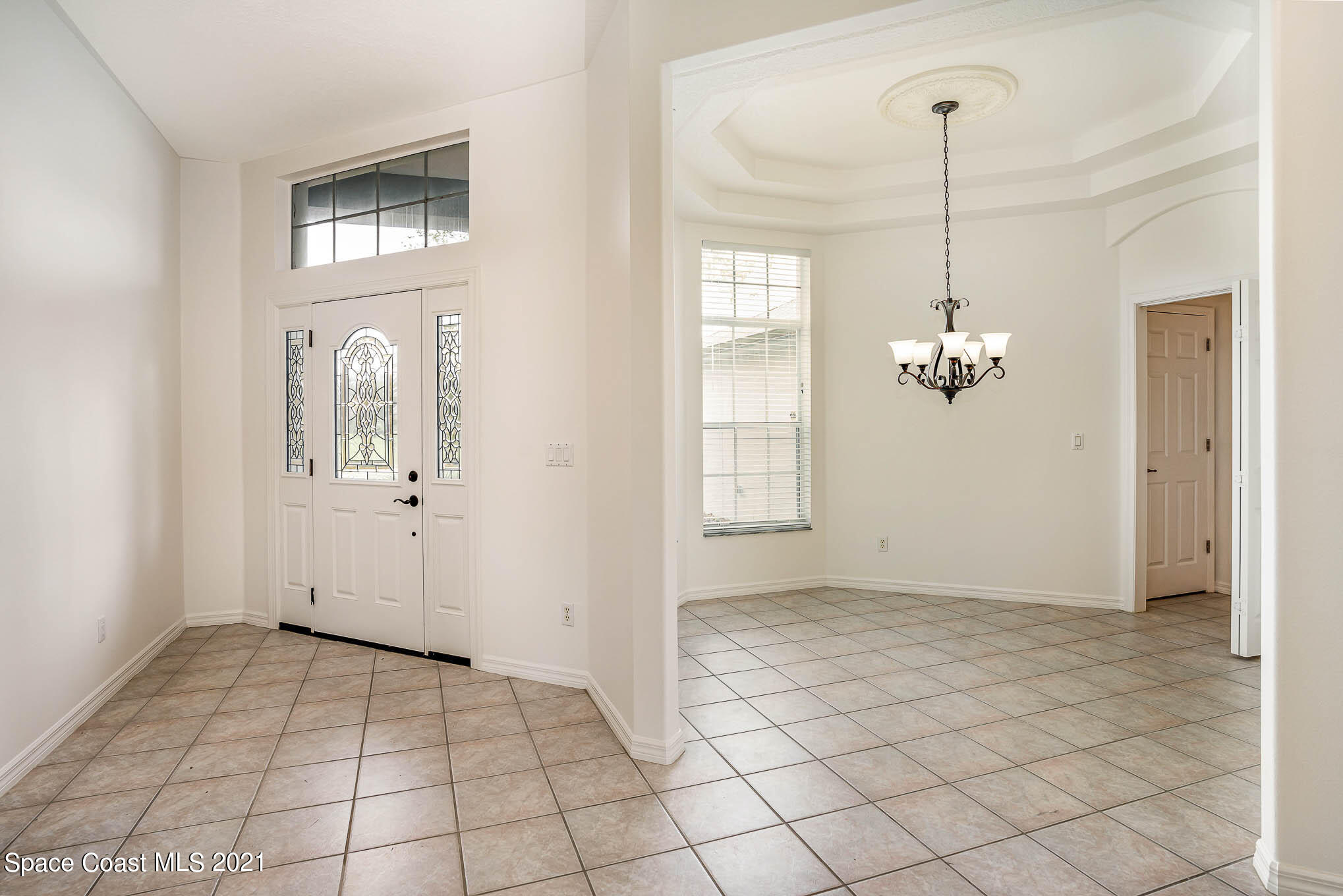 4353 Long Lake Road Melbourne, FL 32934 - Photo 5 of 35 Foyer & Dining Room