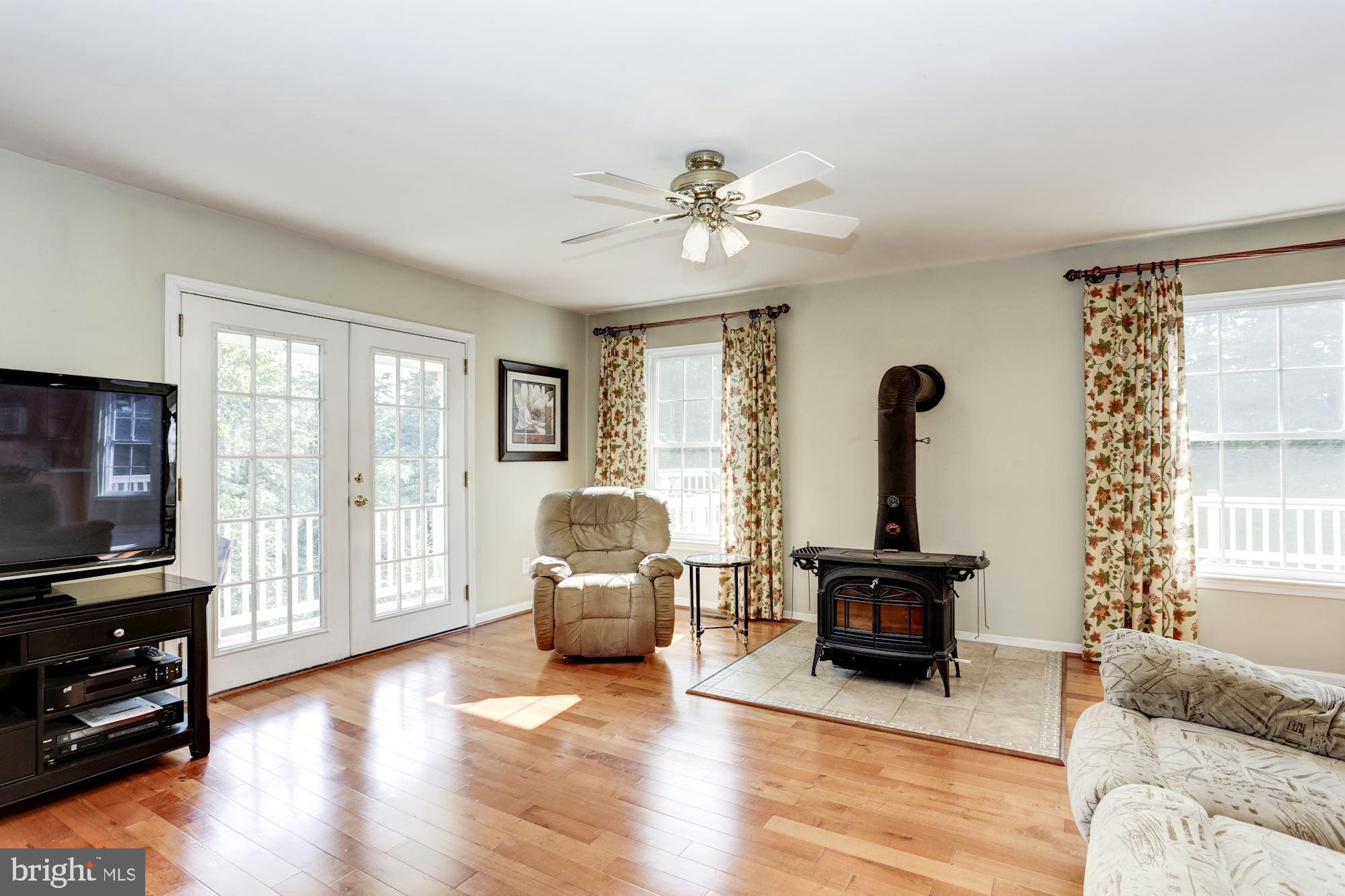 3929 Harrisville Road Mount Airy, MD 21771 - Photo 8 of 47 Great room with wood burning stove