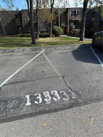 a view of a street with a building