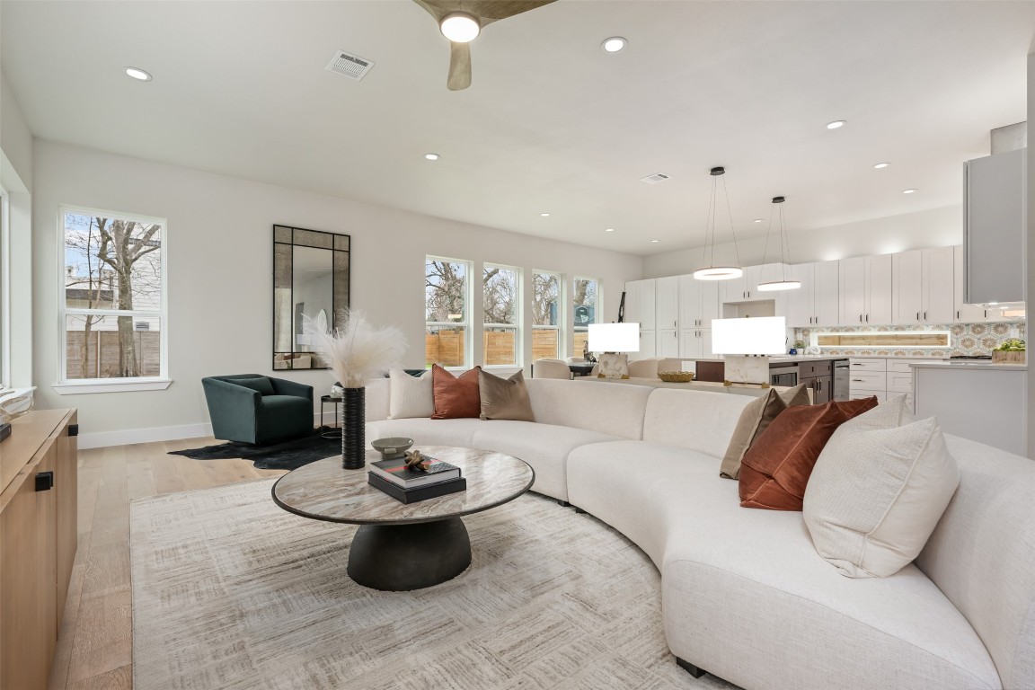 1004 Karen Avenue Austin, TX 78757 - Photo 1 of 29 a living room with furniture and a view of kitchen