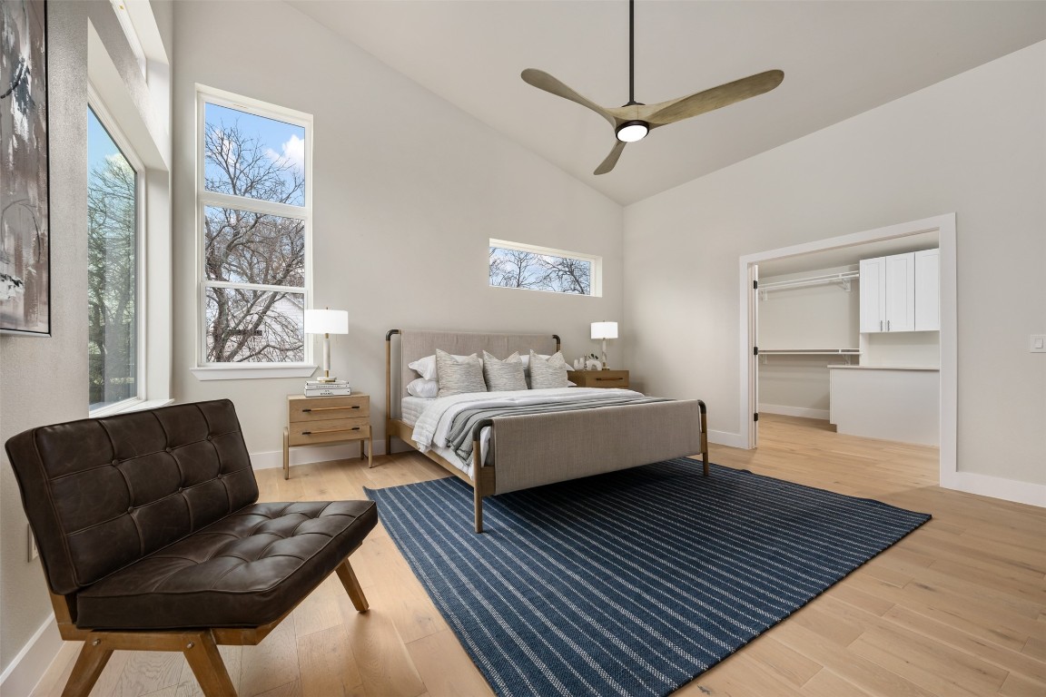 1004 Karen Avenue Austin, TX 78757 - Photo 15 of 29 a bedroom with a bed couch and a window