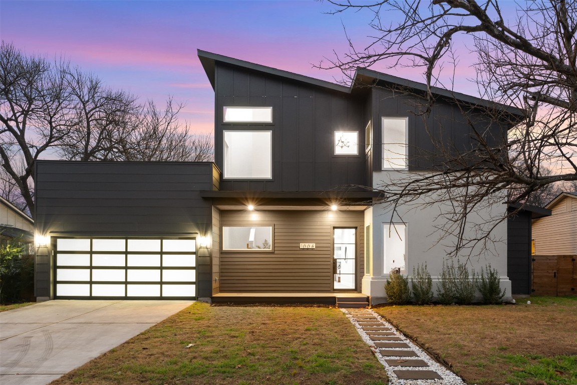 1004 Karen Avenue Austin, TX 78757 - Photo 2 of 29 a view of a house with a garage