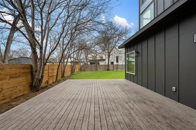 a view of backyard with green space